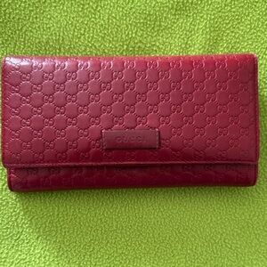 Gucci Red Signature Embossed Leather Wallet